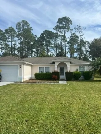 Rent this 3 bed house on 76 Ryan Drive in Palm Coast, FL 32164