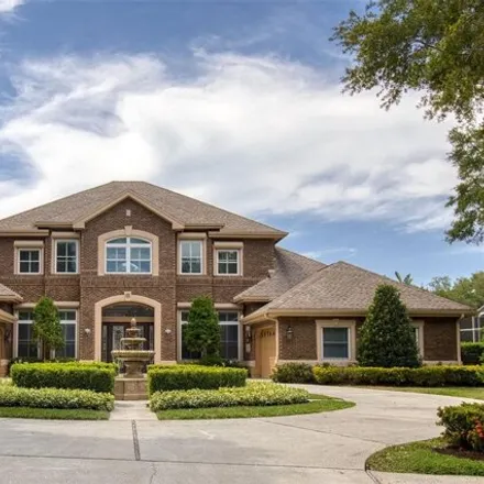 Buy this 5 bed house on Wentworth Golf Club in 2990 Wentworth Way, Tarpon Springs