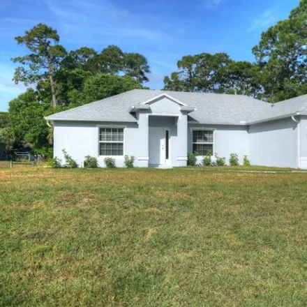 Rent this 3 bed house on 8203 104th Court in Vero Lake Estates, Indian River County