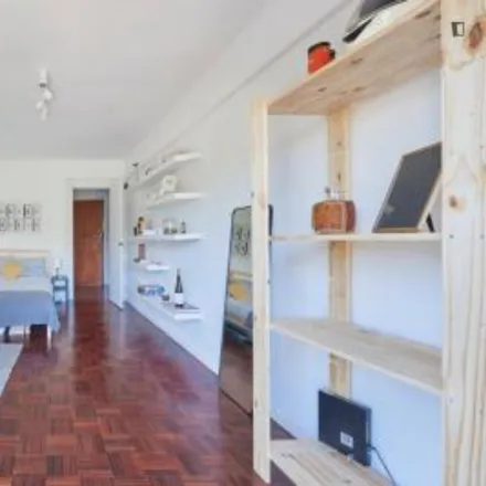 Rent this 2 bed room on Rua Professor Barbosa Sueiro in 1600-477 Lisbon, Portugal