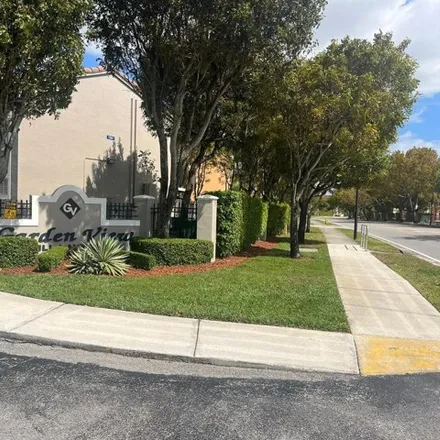 Rent this 2 bed condo on 7221 Northwest 174th Terrace in Miami-Dade County, FL 33015