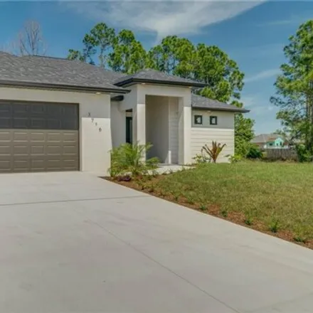 Buy this 3 bed house on 3786 39th Street Southwest in Lehigh Acres, FL 33976