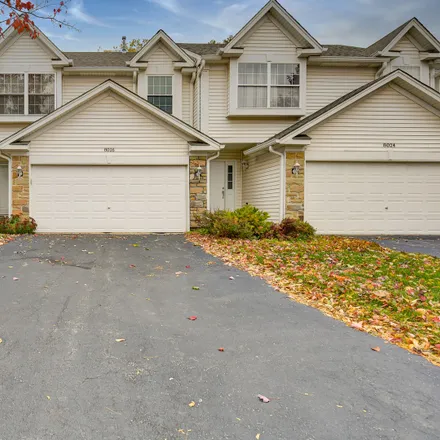 Buy this 2 bed townhouse on 8026 Sierra Woods Lane in Carpentersville, IL 60110