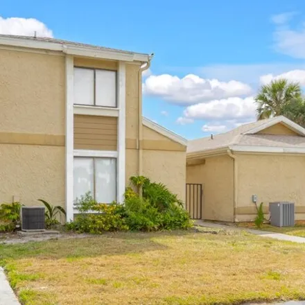 Buy this 3 bed townhouse on 1439 Sheafe Avenue Northeast in Palm Bay, FL 32905