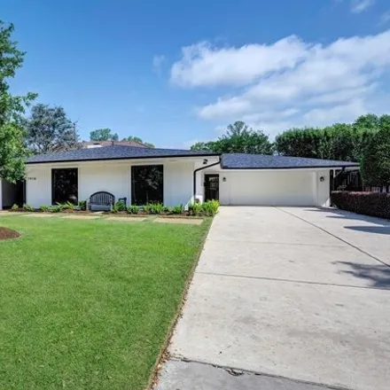 Buy this 4 bed house on 7974 Chevy Chase Drive in Houston, TX 77063