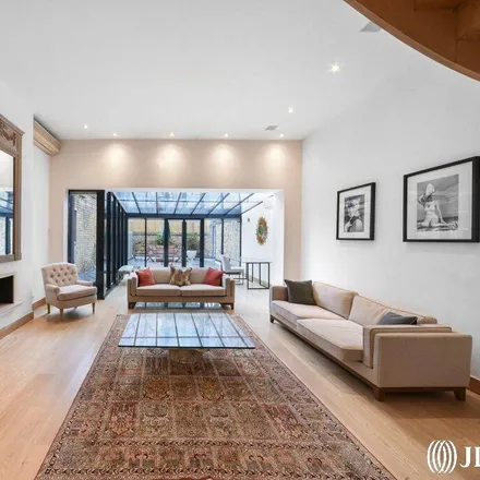 Rent this 4 bed townhouse on 5 Holland Park Avenue in London, W11 3RH