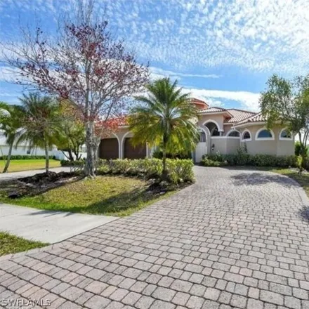 Rent this 3 bed house on 2622 Beach Pkwy W in Cape Coral, Florida