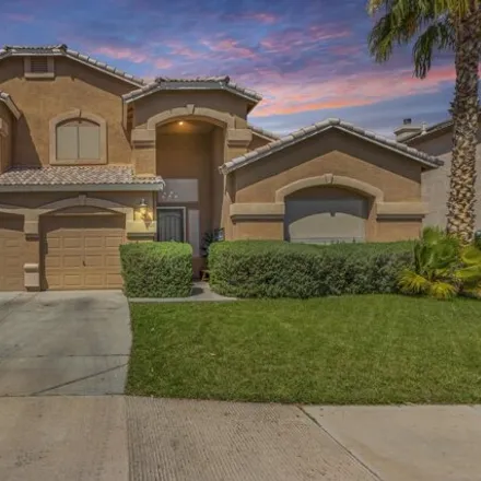Buy this 4 bed house on 6958 East Mirabel Avenue in Mesa, AZ 85209