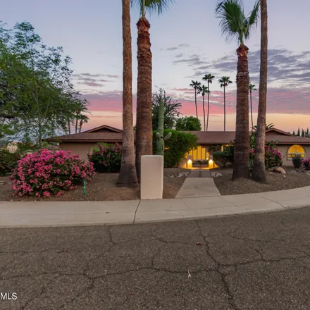 Buy this 5 bed house on 301 West Country Gables Drive in Phoenix, AZ 85023