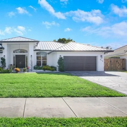 Rent this 3 bed house on 537 Cypress Drive in Tequesta, Palm Beach County