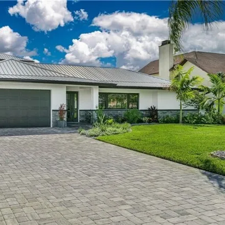 Buy this 4 bed house on 3609 Southeast 21st Place in Cape Coral, FL 33904