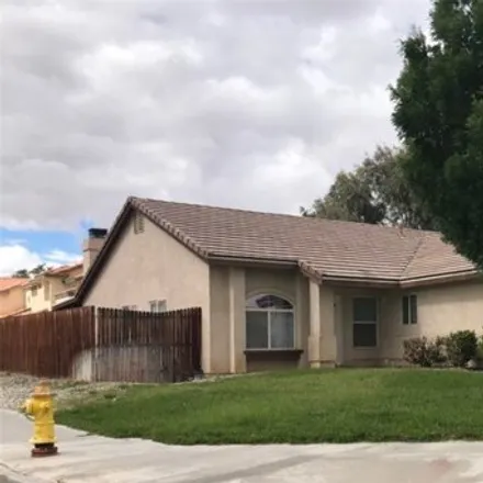 Rent this 4 bed house on 13186 Quiet Canyon Drive in Victorville, CA 92395