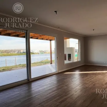 Buy this 3 bed house on unnamed road in Partido de Tigre, 1670 Benavídez