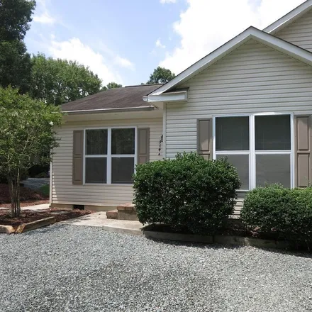 Rent this 2 bed townhouse on 314 Davie Road in Weatherhill, Carrboro
