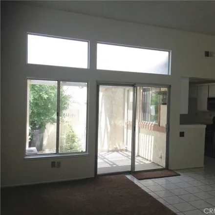 Rent this 2 bed condo on 1674 Coco Palm Court in Corona, CA 92879