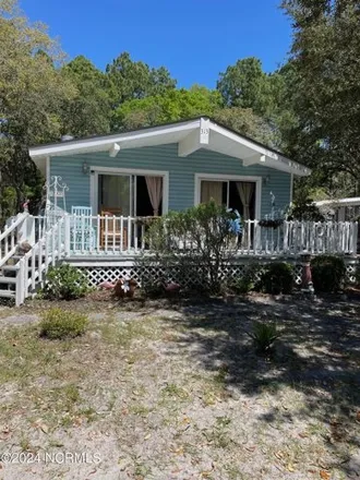Buy this studio apartment on 301 Live Oak Drive in Sunset Beach, Brunswick County