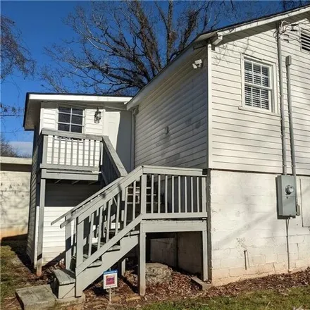 Rent this 2 bed house on 1160 Ewing Place Southwest in Atlanta, GA 30310