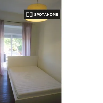 Rent this 4 bed room on IDN in Calçada das Necessidades, 1399-011 Lisbon