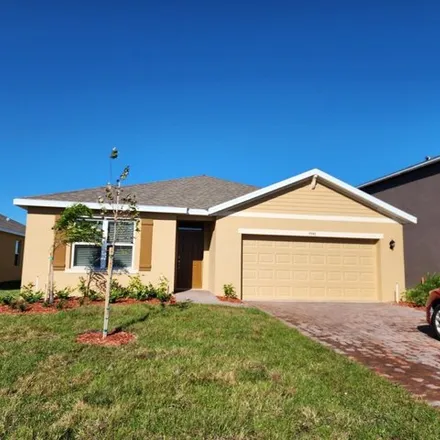 Rent this 4 bed house on Columbia Lane in West Melbourne, FL 32904