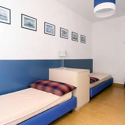 Rent this 2 bed apartment on 57038 Rio Marina LI