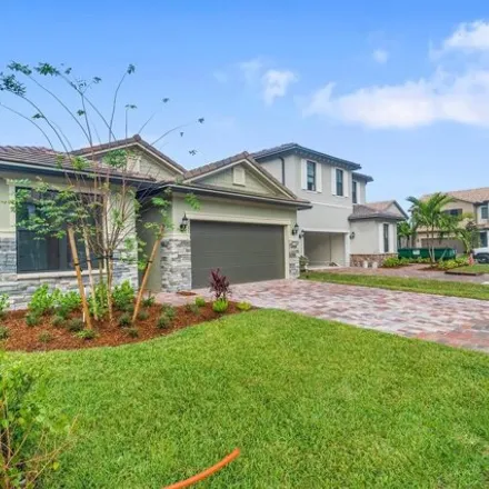Rent this 4 bed house on Tailshot Court in Florida Gardens, Palm Beach County