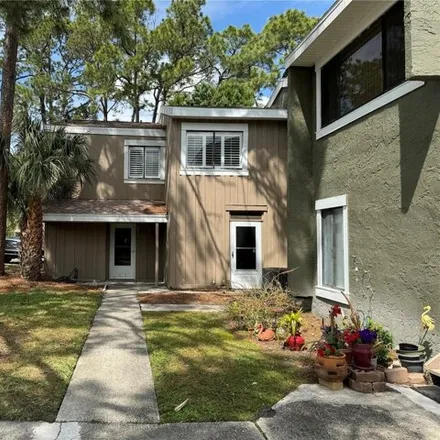 Buy this 3 bed condo on 6011 Windhover Drive in Orlando, FL 32819