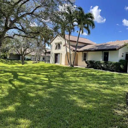 Rent this 3 bed townhouse on Windwood Boulevard in Boca Raton, FL