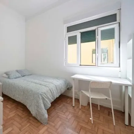 Rent this 4 bed room on Mercearia Lucinda in Rua Sampaio e Pina, 1070-051 Lisbon