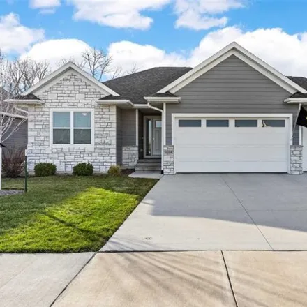 Buy this 4 bed house on 1300 High Country Road in Coralville, IA 52241