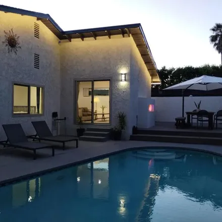 Rent this 4 bed apartment on 21796 Ybarra Road in Los Angeles, CA 91364