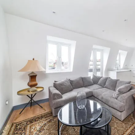 Rent this 2 bed townhouse on 84 Westbourne Grove in London, W2 4UL