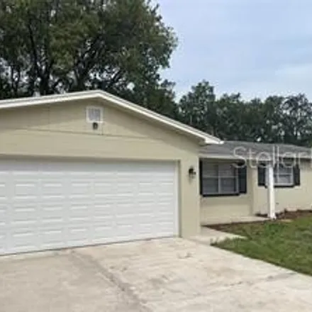 Rent this 3 bed house on 1546 Churchill Court in Combee Settlement, Polk County
