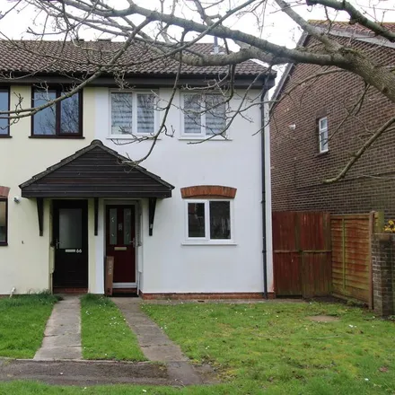 Rent this 2 bed townhouse on Rodney Drive in Christchurch, BH23 3LL