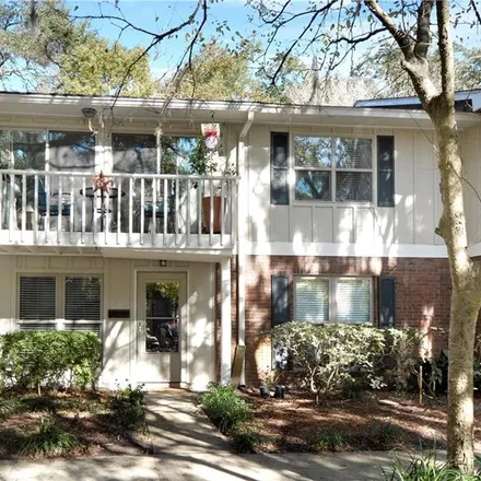 Rent this 2 bed condo on 901 Mallery Street in Mallory Park, Saint Simons