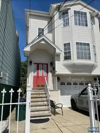 Buy this 6 bed townhouse on 619 North 9th Street in Newark, NJ 07107