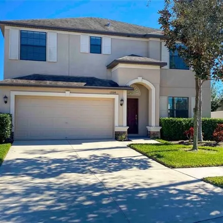Rent this 4 bed house on 13380 Wellington Hills Drive in Hillsborough County, FL 33579