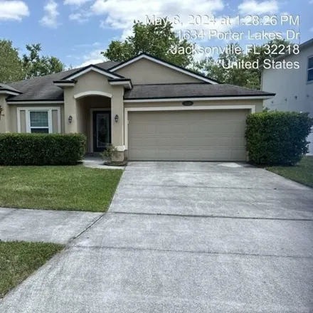Rent this 4 bed house on 1662 Porter Lakes Drive in Jacksonville, FL 32218