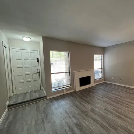 Buy this 2 bed townhouse on Park Willows Lane in Arlington, TX 76011