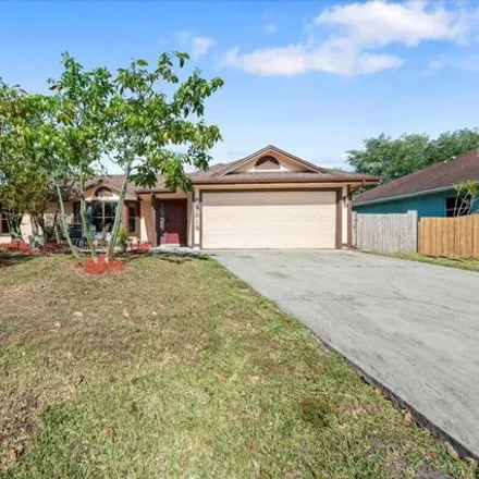 Buy this 3 bed house on 3818 Sw Alice St in Port Saint Lucie, Florida