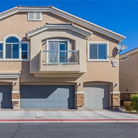 Buy this 2 bed townhouse on 5542 Box Cars Court in Las Vegas, NV 89122