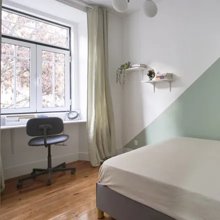 Rent this 8 bed room on Rua da Ilha do Pico 20 in 1000-169 Lisbon, Portugal
