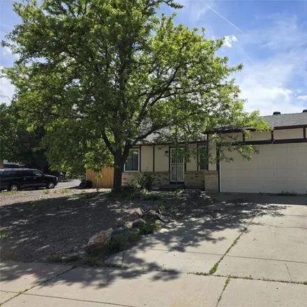 Buy this 4 bed house on 17296 E Wagontrail Pkwy in Aurora, Colorado