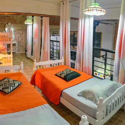 Rent this 2 bed apartment on La California Restaurant in Crespo 55, Havana