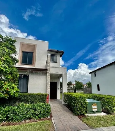 Buy this 3 bed townhouse on 613 Ne 208th Ter Unit 613 in Miami, Florida