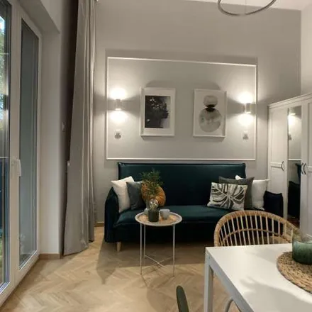 Rent this 1 bed apartment on Łopuszańska 38D in 02-232 Warsaw, Poland