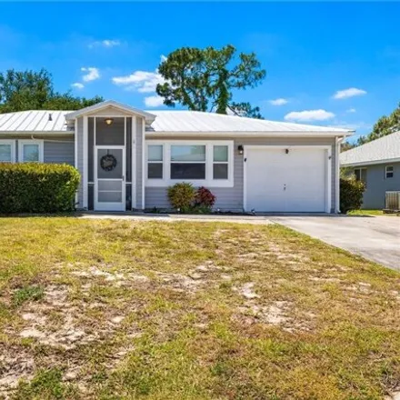 Buy this 3 bed house on 8598 Cypress Drive South in San Carlos Park, FL 33967