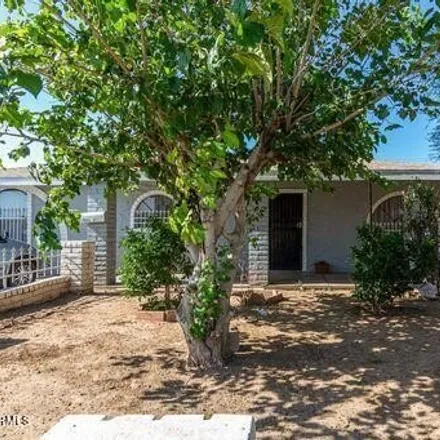 Buy this 4 bed house on 3806 W Thomas Rd in Phoenix, Arizona