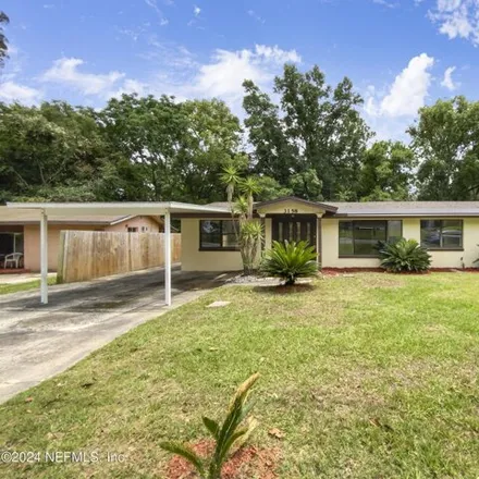 Buy this 4 bed house on 3106 East Altamont Avenue in Beverly Hills, Jacksonville