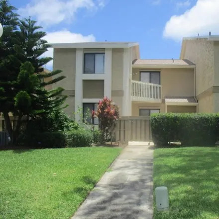 Rent this 2 bed house on 1002 Abada Court Northeast in Palm Bay, FL 32905