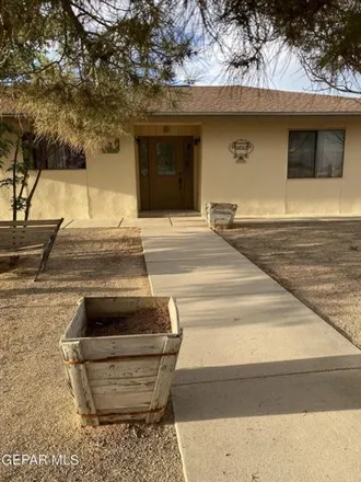 Buy this 4 bed house on Jim Bridger in McCracken Estates Colonia, El Paso County